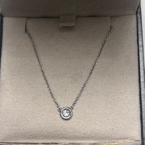 18k white gold and diamond Forever mark necklace.